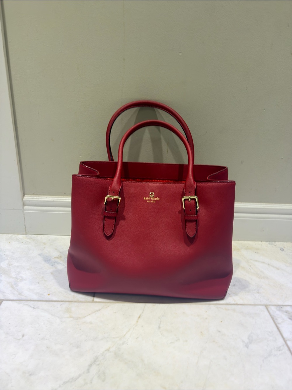kate spade red leather satchel handbag with gold-tone hardware